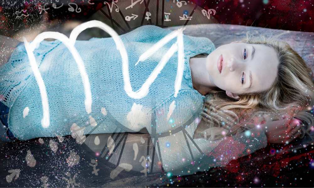 a lady lying down surrounded by the symbol for Scorpio and stars