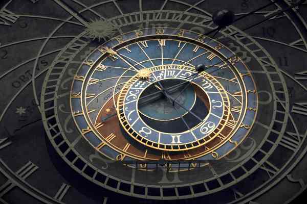 a Vedic Astrology Chart. The surrounds are darkened with light highlighting the center